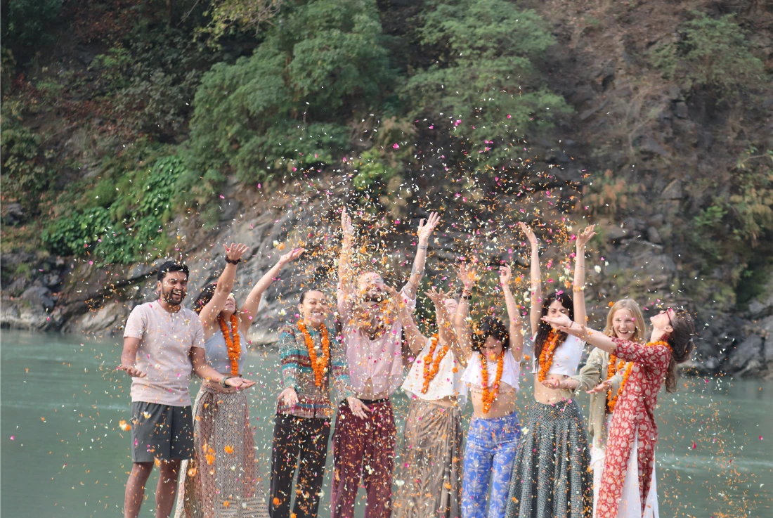 Students celebrating by the Ganga