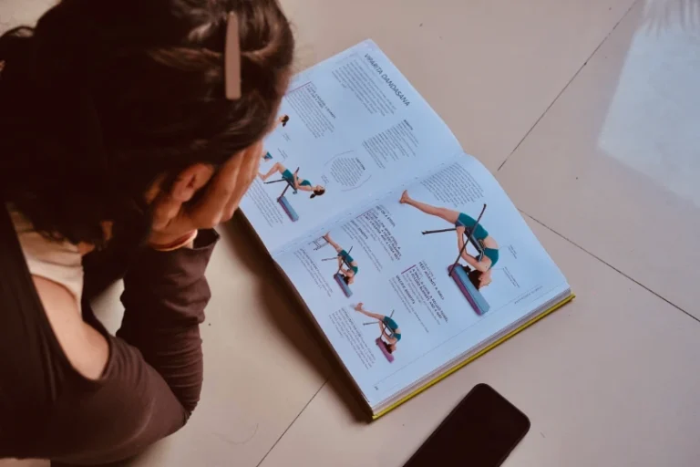 Student reading the Prakruti anatomy handbook